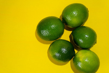 Set of limes on colorful background