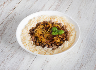 Mujadarra - Arabian dish with rice and lentils. 