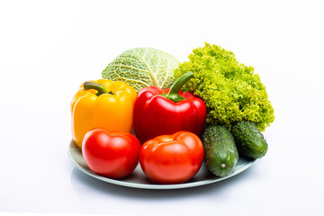 Fresh vegetables isolated on a white background.