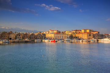 Old Venetian port of Chania at sunrise on Crete, Greece