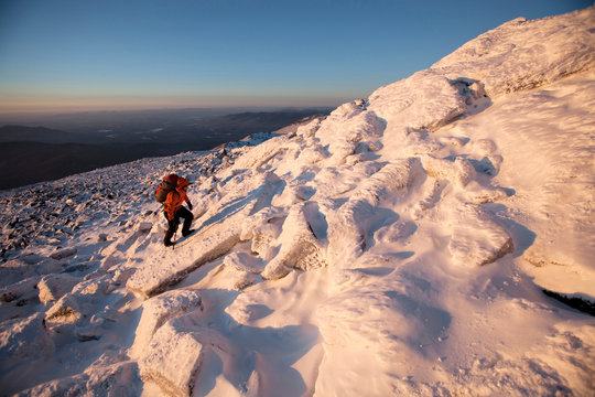 Ryan Buckley, Summit Intern hikes the northwest area of Mt. Washington's summit cone during some time off from his work.