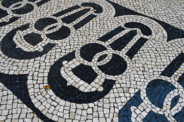 Traditional portuguese stone mosaic calcade in Lisbon