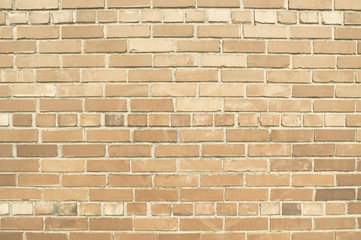 Old beige brick wall background