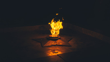 Eternal flame.  Flame in the dark.