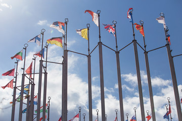 Fototapeta na wymiar Flags of European states on flagpoles