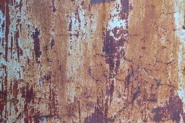Old rusty zinc fence with rough skin pattern for backdrop background 
