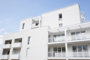 white Residental Building on blue sky background