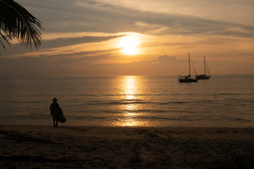 Silhouette of an active fisherman