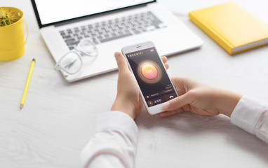 Man holds a tablet and looks at the screen. Mobile development. Innovational online businesses. Internet technologies. Trendy design. Geometry. Fashionable vibrant colors. Using a device. UX and UI.