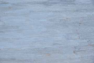 Naklejka premium Light grey-violet wooden texture with crackled paint. Aged wood surface, copy-space