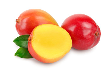 Mango fruit half with leaves and slices isolated on white background close-up