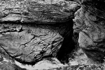 River Flowing through Eroded Rocks in Appalachian Mountains in Black and White