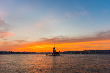 Fototapeta na wymiar Maiden's Tower with sunset sky in Istanbul, Turkey (KIZ KULESI - USKUDAR).