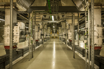 The interior of the Roskilde Power Plant with electrical installations and pipes