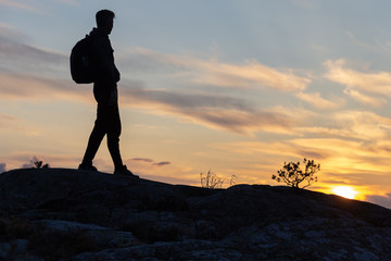 Explorer silhouette in the nature