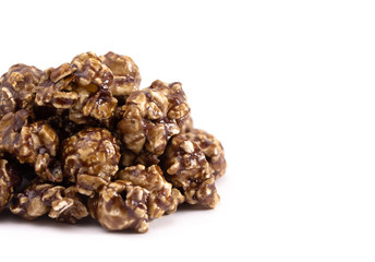 Pile of Coffee Flavored Candy Coated Popcorn on a White Background