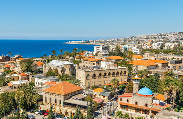 Mediterranean city historic center panorama with old church and mosque and residential buildings in...