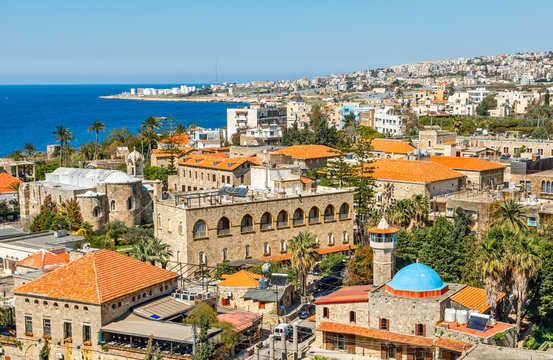 Mediterranean city historic center panorama with old church and mosque and residential buildings in the background, Biblos, Lebanon