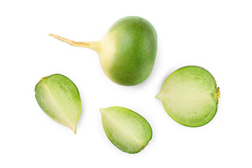 green radish with slices isolated on white background. Top view. Flat lay