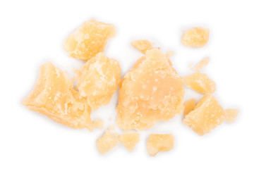 Parmesan cheese pieces isolated on white background. Closeup. Top view. Flat lay