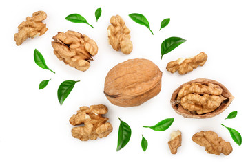 Walnuts with leaf isolated on white background. Top view. Flat lay
