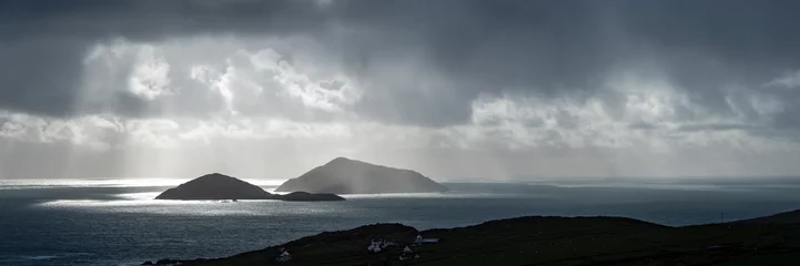 Foto op Aluminium a view of the wild atlantic way off the coast of the ring of kerry in ireland showing skellig michael and surrounding islands in beautiful strong light with cloudy skies  © Andy Morehouse