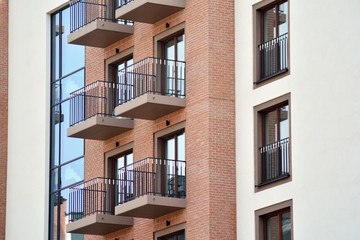 Fragment of a modern apartment building in front. Very modern apartment house.