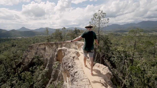 Pai Canyon Thailand Friends Hike Ridge balancing on path