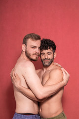 Fototapeta na wymiar sexy gay couple, hugging each other.