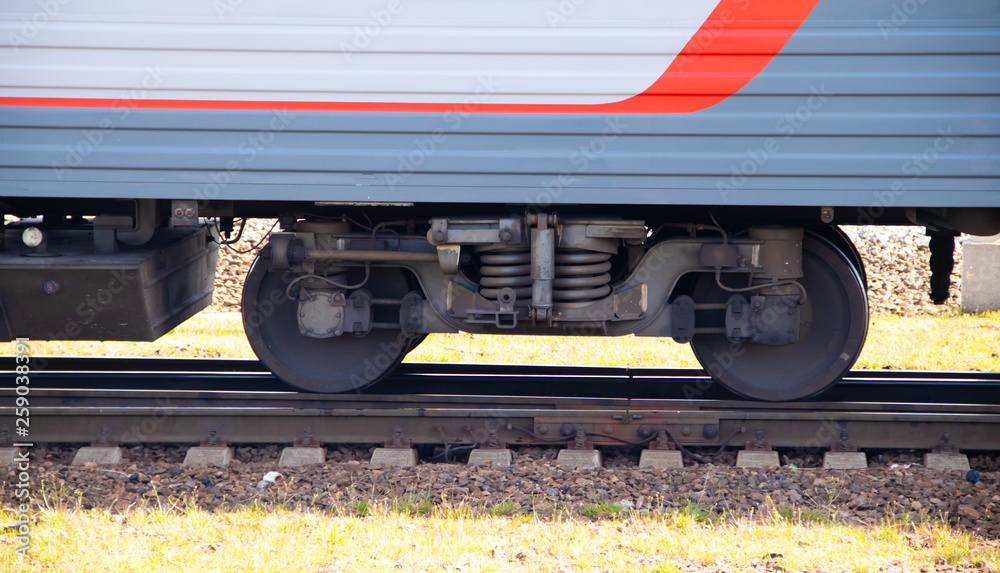 Wall mural the wheels of a train car. russian railway. transport. cargo transportation by rail