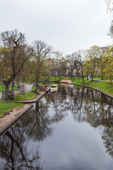 Fototapeta na wymiar Passenger boats on the river in the city of Riga