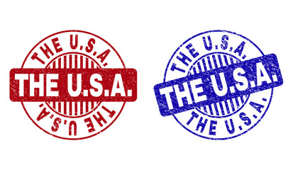 Grunge THE U.S.A. round stamp seals isolated on a white background. Round seals with grunge texture in red and blue colors. Vector rubber imitation of THE U.S.A. title inside circle form with stripes.