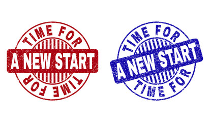 Grunge TIME FOR A NEW START round stamp seals isolated on a white background. Round seals with grunge texture in red and blue colors.