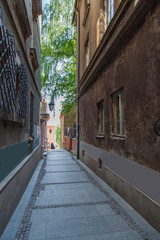 Narrow streets of Warsaw with old lanterns