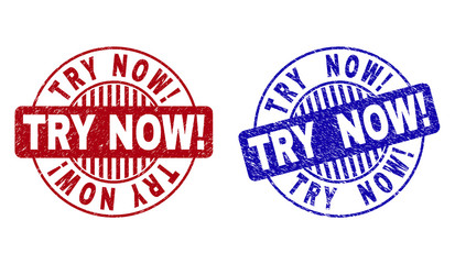 Grunge TRY NOW! round stamp seals isolated on a white background. Round seals with grunge texture in red and blue colors. Vector rubber imitation of TRY NOW! label inside circle form with stripes.
