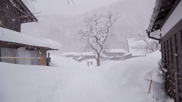 The traditionally thatched houses in Shirakawa-go where is the mountain village among the snow near Gifu, Ishikawa, and Toyama prefecture in the winter, Japan