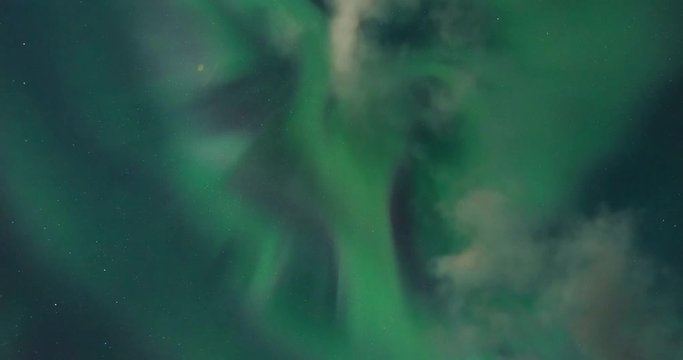Timelapse of pulsating northern lights with night sky in view