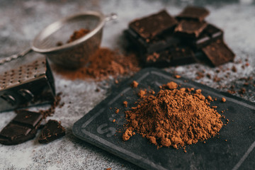 black chocolate and cocoa powder lie beautifully on the table