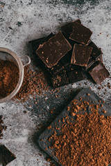 black chocolate and cocoa powder lie beautifully on the table