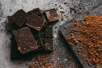 black chocolate and cocoa powder lie beautifully on the table
