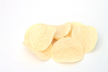Potato chips are a favorite snack for everyone, isolated on white background.