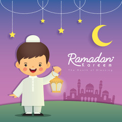 Ramadan greeting card. Cute cartoon muslim boy holding lantern with crescent moon, stars and mosque as background. Vector illustration. Ramadan Kareem means Ramadan the Generous Month. 