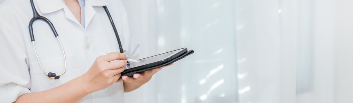 Closeup Asian Woman Doctor Hand Holding Ipad Gadget With Copy Space Over White Background. Healthcare And Medical People Sickness Concept Banner