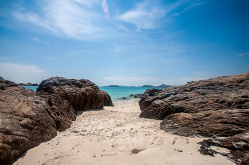 Fototapeta na wymiar Beautiful sea with clear turquoise blue water summer coast rock on sunshine day