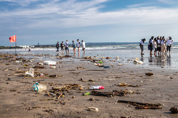 Beach in Kuta Bali with people on the background