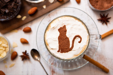 cat mark decorated on cup of hot chocolate
