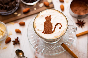 cat mark decorated on cup of hot chocolate