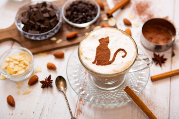 cat mark decorated on cup of hot chocolate