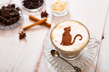 cat mark decorated on cup of hot chocolate