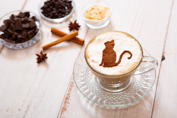 cat mark decorated on cup of hot chocolate